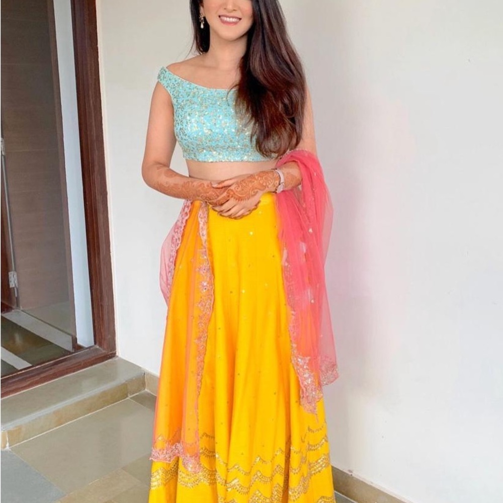 Vibrant Light Haldi outfit Megha and Jigar